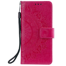 For iPhone 14 Pro Max Totem Flower Embossed Leather Case (Red)