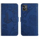 For Motorola Moto G32 HT03 Skin Feel Butterfly Embossed Flip Leather Phone Case(Blue)