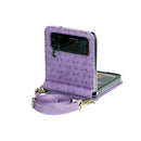 For Samsung Galaxy Z Flip4 Embossed Leather Folded Phone Case with Strap(Purple)