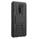 For Xiaomi Redmi 9 Tire Texture Shockproof TPU + PC Protective Case with Holder(Black)