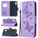 For Xiaomi Redmi 9A Two Butterflies Embossing Pattern Horizontal Flip Leather Case with Holder & Card Slot & Wallet & Lanyard(Purple)