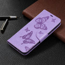 For Xiaomi Redmi 9A Two Butterflies Embossing Pattern Horizontal Flip Leather Case with Holder & Card Slot & Wallet & Lanyard(Purple)