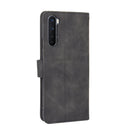 For OnePlus Nord Solid Color Skin Feel Magnetic Buckle Horizontal Flip Calf Texture PU Leather Case with Holder & Card Slots & Wallet(Black)