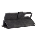 For OnePlus Nord Solid Color Skin Feel Magnetic Buckle Horizontal Flip Calf Texture PU Leather Case with Holder & Card Slots & Wallet(Black)