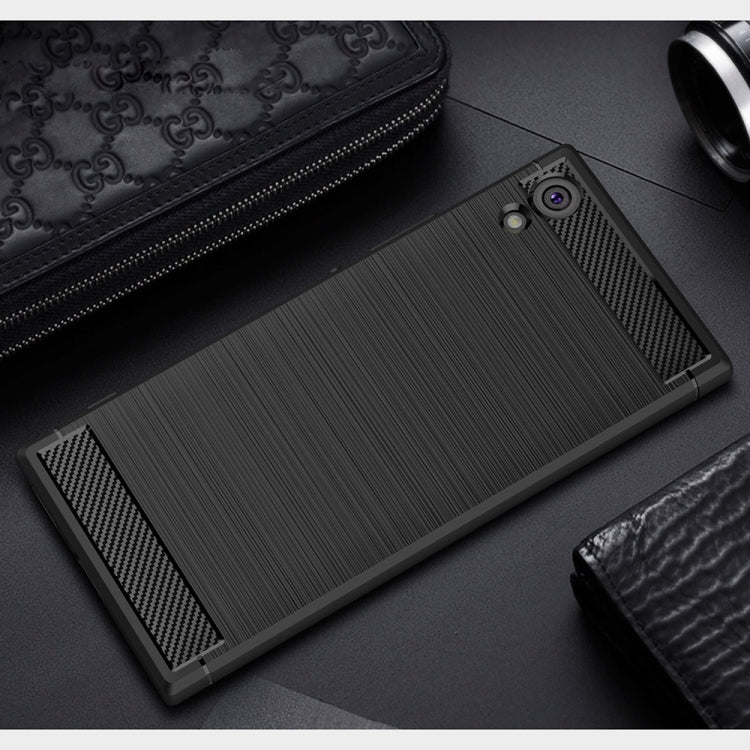 For Sony Xperia XA1 Ultra Brushed Texture Carbon Fiber Shockproof TPU Rugged Armor Protective Case(Black)