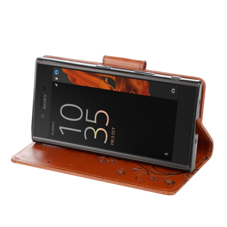 For Sony Xperia XZ Butterflies Love Flowers Embossing Horizontal Flip Leather Case with Holder & Card Slots & Wallet & Lanyard(Brown)