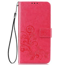 For Samsung Galaxy A21s Four-leaf Clasp Embossed Buckle Mobile Phone Protection Leather Case with Lanyard & Card Slot & Wallet & Bracket Function(Magenta)