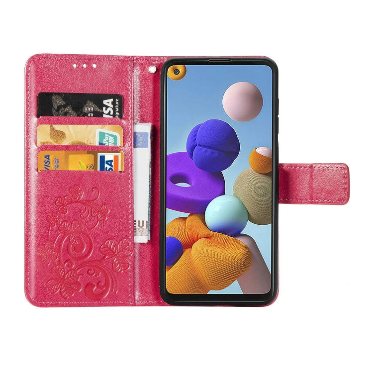 For Samsung Galaxy A21s Four-leaf Clasp Embossed Buckle Mobile Phone Protection Leather Case with Lanyard & Card Slot & Wallet & Bracket Function(Magenta)