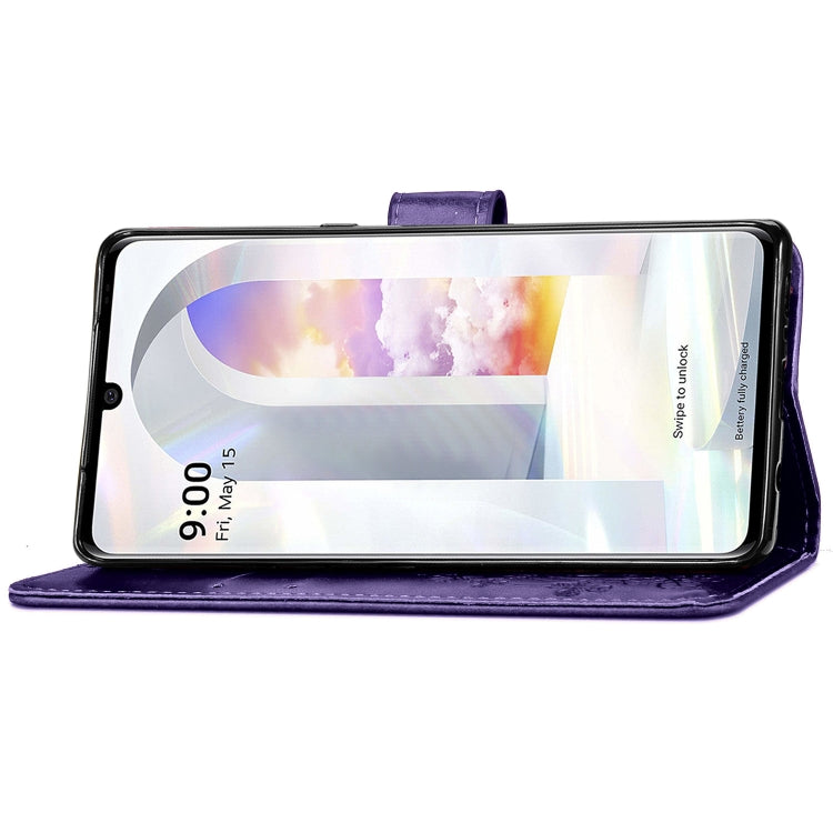 For LG Velvet 5G Four-leaf Clasp Embossed Buckle Mobile Phone Protection Leather Case with Lanyard & Card Slot & Wallet & Bracket Function(Purple)