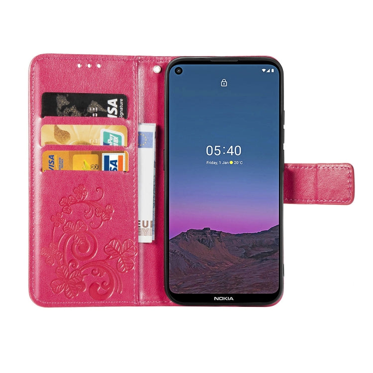 For Nokia 5.4 Four-leaf Clasp Embossed Buckle Mobile Phone Protection Leather Case with Lanyard & Card Slot & Wallet & Bracket Function(Magenta)