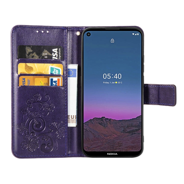 For Nokia 5.4 Four-leaf Clasp Embossed Buckle Mobile Phone Protection Leather Case with Lanyard & Card Slot & Wallet & Bracket Function(Purple)