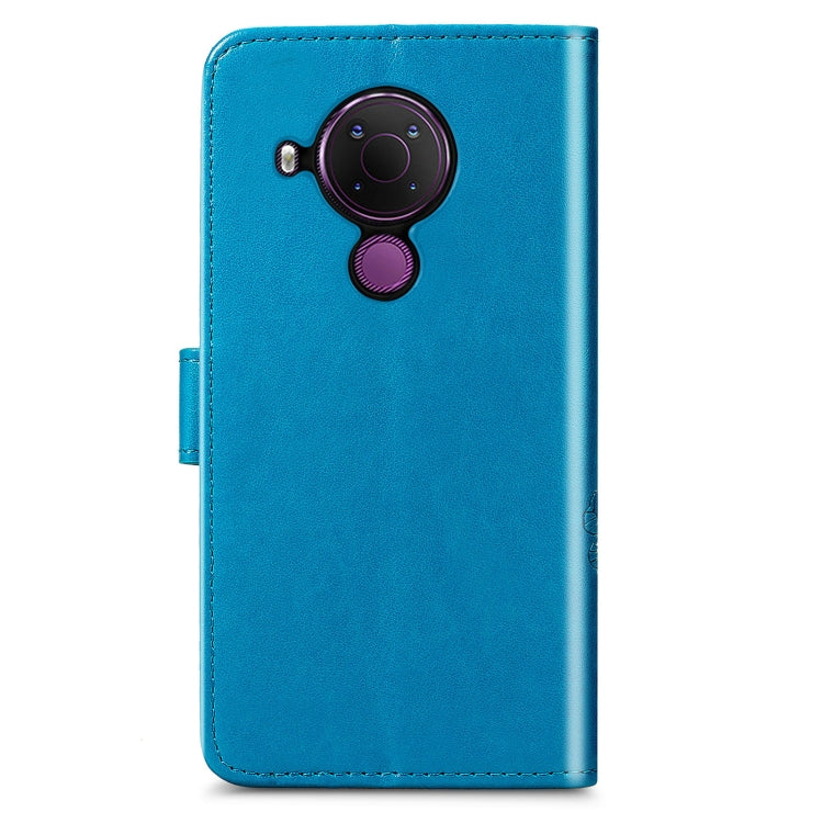 For Nokia 5.4 Four-leaf Clasp Embossed Buckle Mobile Phone Protection Leather Case with Lanyard & Card Slot & Wallet & Bracket Function(Blue)