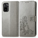 For Xiaomi Redmi Note 10 4G Four-leaf Clasp Embossed Buckle Mobile Phone Protection Leather Case with Lanyard & Card Slot & Wallet & Bracket Function(Grey)