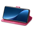 For Xiaomi 12 Pro Four-leaf Clasp Embossed Buckle Leather Phone Case(Magenta)