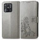 For Xiaomi Redmi 10C Four-leaf Clasp Embossed Buckle Leather Phone Case(Gray)