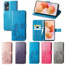 For Xiaomi 12T / 12T Pro / Redmi K50 Ultra Four-leaf Clasp Embossed Buckle Leather Phone Case(Purple)