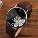 YAZOLE Ladies OL Style Four-leaf Clover Pattern Quartz Watch(338 black plate silver flower black belt)