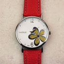 YAZOLE Ladies OL Style Four-leaf Clover Pattern Quartz Watch(338 black plate silver flower black belt)