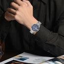 CAGARNY 6820 Fashionable Business Style Large Dial Dual Time Zone Quar0tz Movement Wrist Watch with Stainless Steel Band & Calendar Function for Men(Silver Band Blue Window)