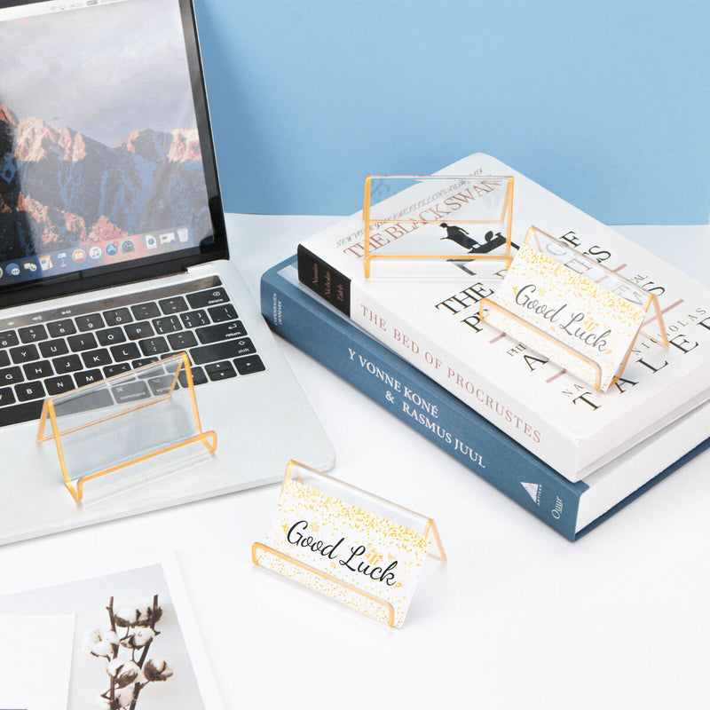 The quality of 12 KP stand brand is 9*6.3*4.8cm the material is acrylic a