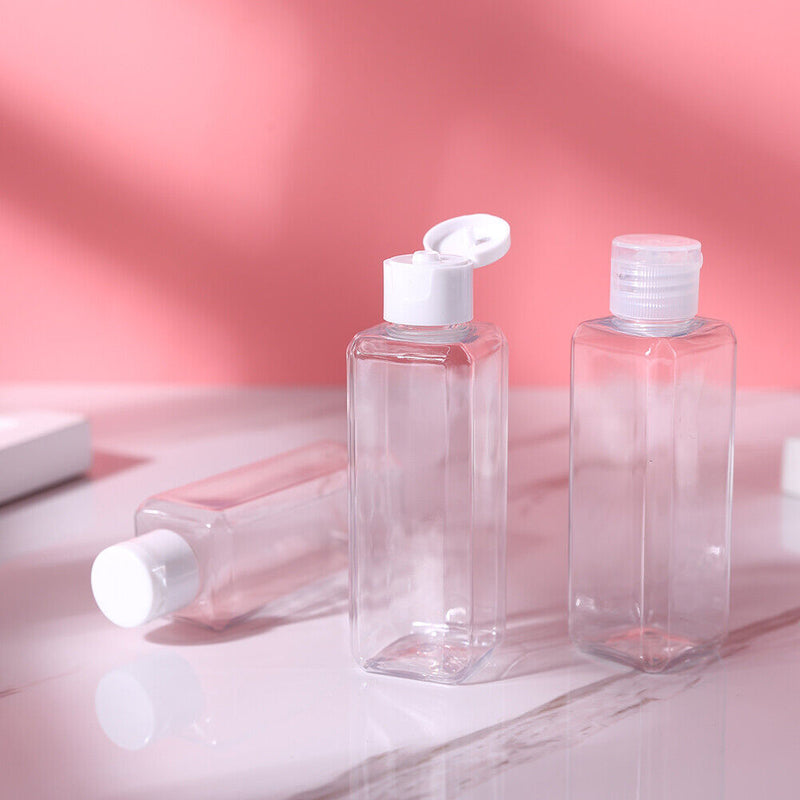 4pcs Travel Sub-Bottle 100ml Empty Plastic Flip Cap Split Bottles Funnel Set