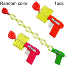 Kids Retractable Elastic Fist Shooter Gun Telescopic Toys Novelty Trick Gag R2S3