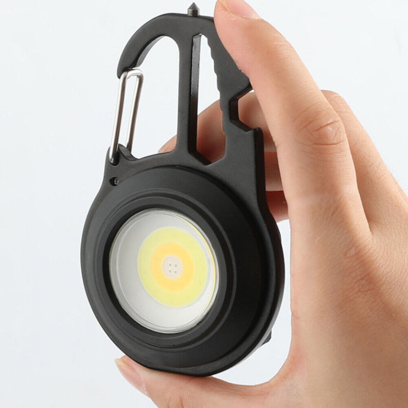 #A Multi-functional LED COB Flashlight Keychain Portable Bottle Opener for Campi