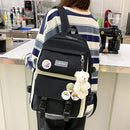 Women Fashion Canvas 4pcs Hit Color Backpack with Badge Pendant Shoulder Bag