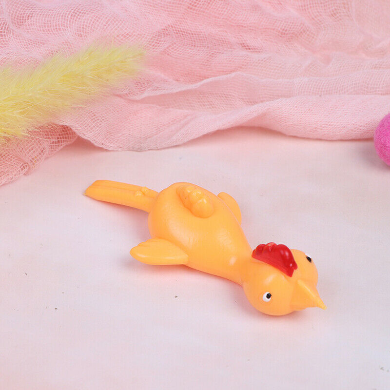 Novelty Funny Sticky Flying Rubber Sling Shot Chicken Flying Finger  OZ