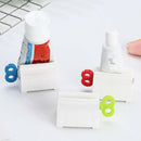 Plastic Rolling Tube Toothpaste Seat Holder Rotate Bathroom Rotate Squeezer   Z