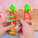 1Pcs Clockwork Spring Multi-colour Wind-up Dancing Walking Robot Dancing T_