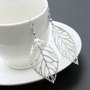 Women'S Earrings Hot Fashion Jewelry Hollow Metal Leaves Dangling Long Stat N9E5