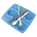 Mould in silicone ice tray-shaped guitar. X6C3