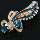 Rhinestone detailing turquoise-green metal leaves barrette