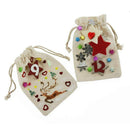 12 cotton bags with practical drawstrings, measuring approximately 15x10cm