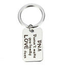 Family Gift "DNA Doesn't Make You Family Love Does"Stainless Steel Key chain- OZ