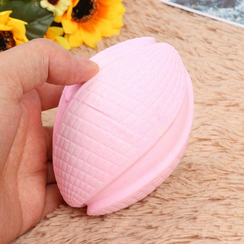 Pet Rugby Shape Chew Toys Dog Bite Tooth Clean Interactive Balls (Pink)