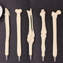 5Pcs 0.5mm Writing Supplies Bone Shape Ballpoint Pen HOT Gift Office Statio F7F3