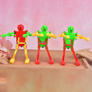 1Pcs Clockwork Spring Multi-colour Wind-up Dancing Walking Robot Dancing T_