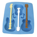 Mould in silicone ice tray-shaped guitar. O9N5