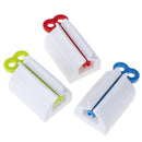 Plastic Rolling Tube Toothpaste Seat Holder Rotate Bathroom Rotate Squeezer   Z