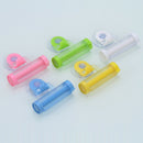 1PC Toothpaste dispenser rolling squeezer hanging hook suction plastic tube BX