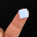Blue Thermal Pad CPU Heatsink Cooling Conductive Silicone 10mm*10mm*1mm x100Pcs