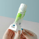 Plastic Rolling Tube Toothpaste Seat Holder Rotate Bathroom Rotate Squeezer   Z