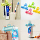 5X(New roles Squeezer Toothpaste Dispenser Tube partner Sucker Hange holde C9N3)