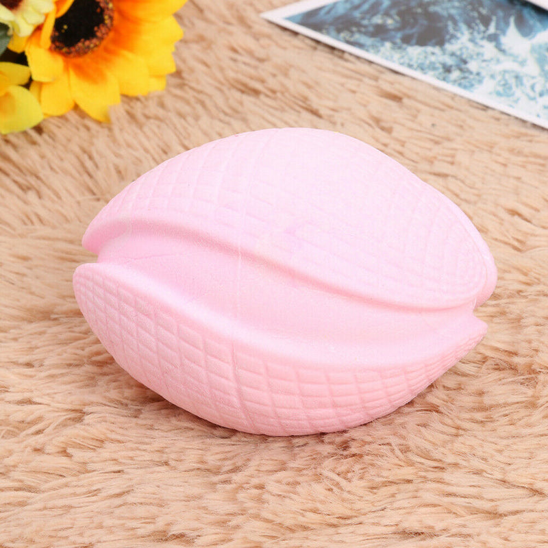 Pet Rugby Shape Chew Toys Dog Bite Tooth Clean Interactive Balls (Pink)