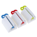 Plastic Rolling Tube Toothpaste Seat Holder Rotate Bathroom Rotate Squeezer   Z