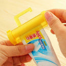 1X Plastic Colorful Rolling Tube Squeezer Toothpaste P3E6 Bath la Easy Disp N7E9