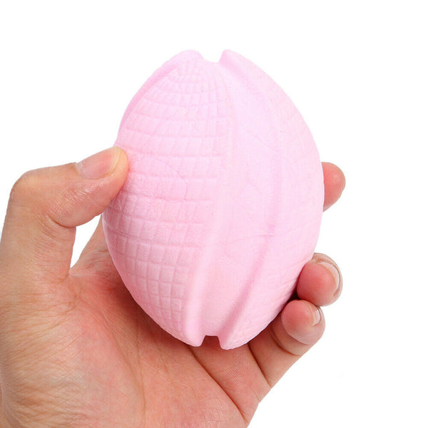 Pet Rugby Shape Chew Toys Dog Bite Tooth Clean Interactive Balls (Pink) A#S