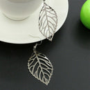 4X(Women'S Earrings Hot Fashion Jewelry Hollow Metal Leaves Dangling Long SV4M6)